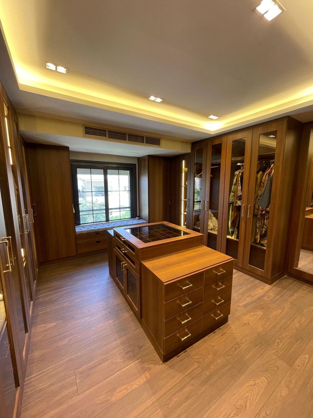 Walnut walk-in dressing room island