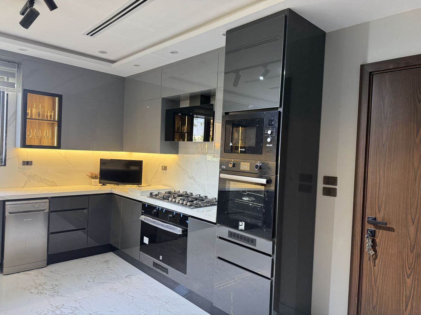 Modern kitchen with built-in oven tower